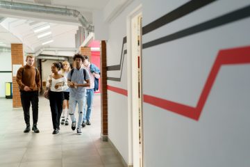 Ukrainian students walking down a corridor to their internships