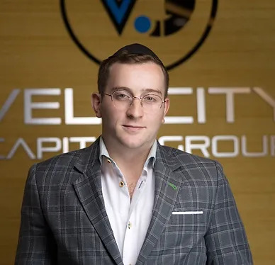 A headshot of Jay Avigdor, CEO of Velocity Capital Group
