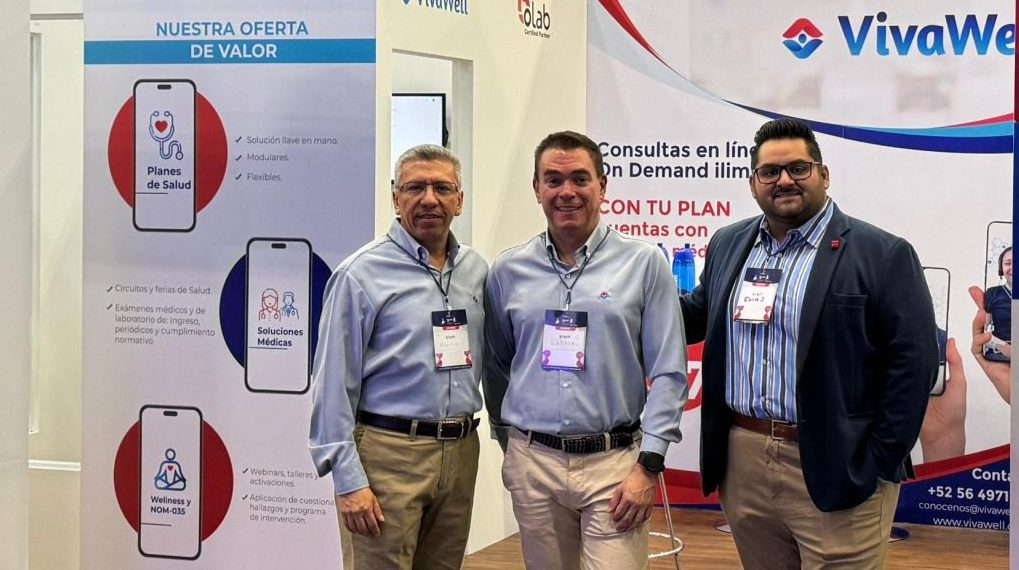The VivaWell team at a trade show by their stall